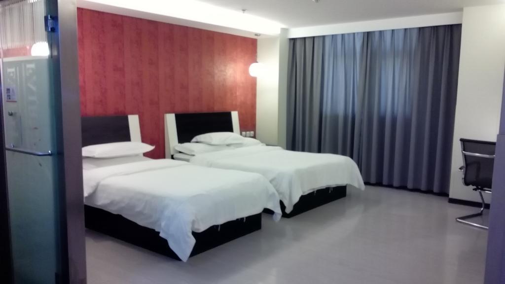 Fairyland Hotel Dongfeng Plaza Куньмін Номер фото