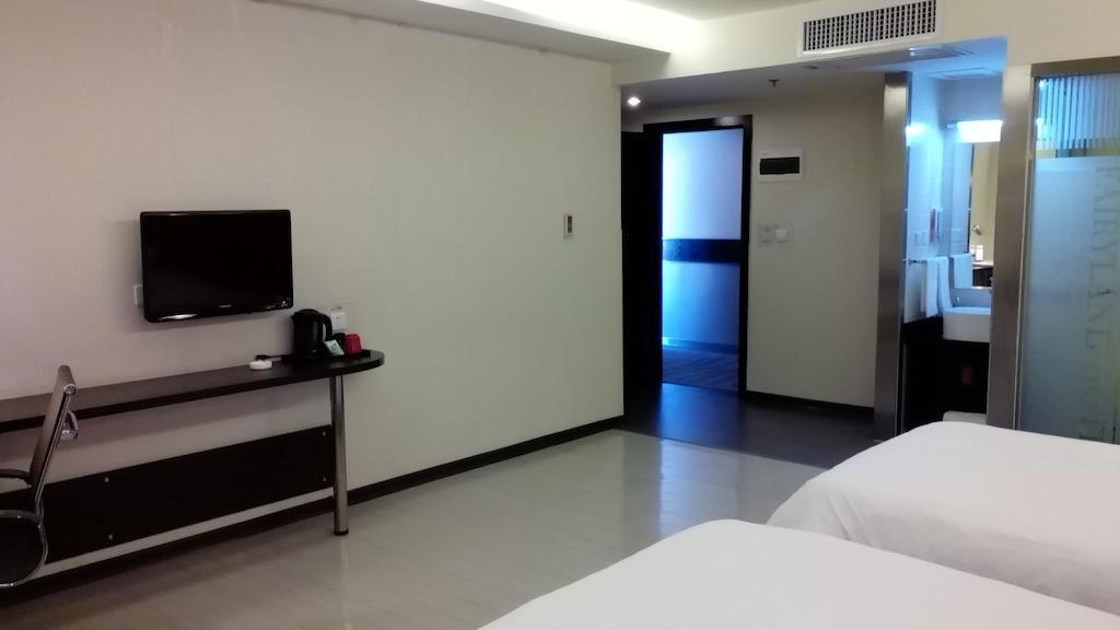 Fairyland Hotel Dongfeng Plaza Куньмін Номер фото