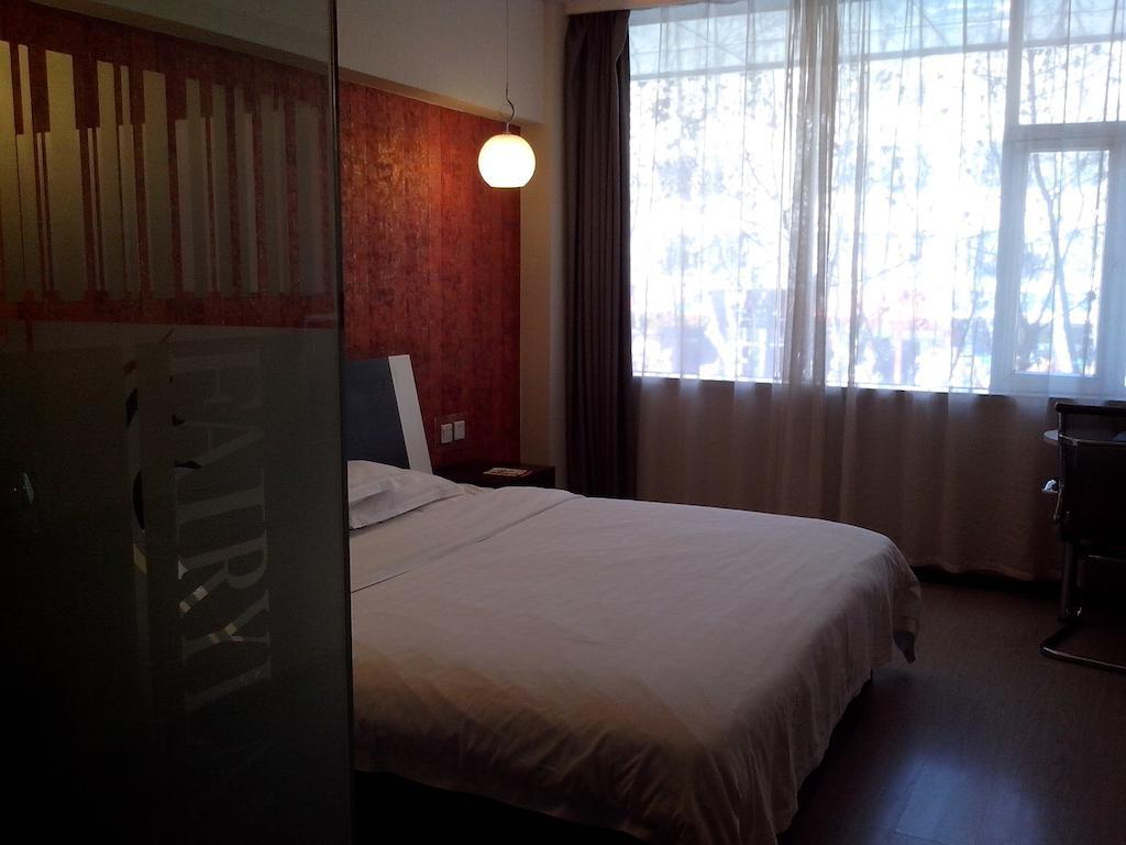 Fairyland Hotel Dongfeng Plaza Куньмін Номер фото