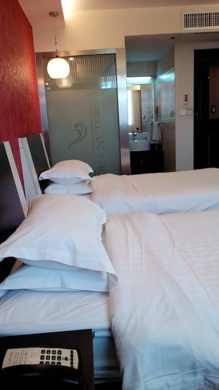 Fairyland Hotel Dongfeng Plaza Куньмін Екстер'єр фото