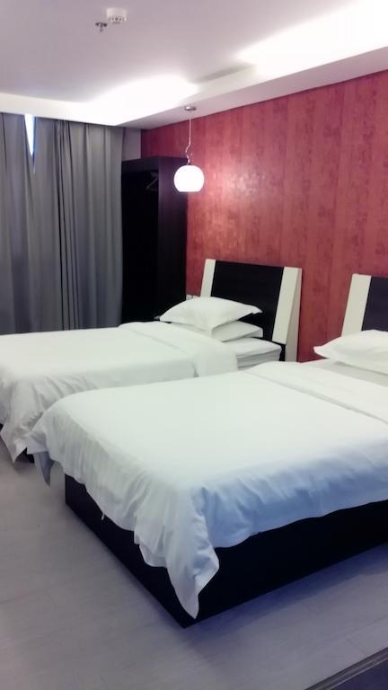 Fairyland Hotel Dongfeng Plaza Куньмін Номер фото