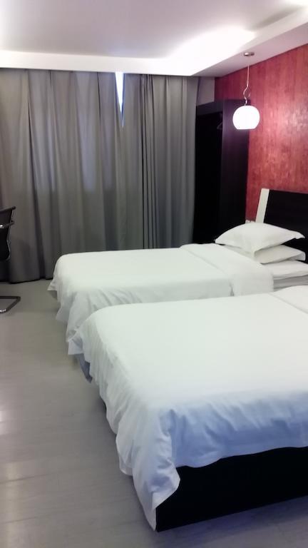 Fairyland Hotel Dongfeng Plaza Куньмін Екстер'єр фото